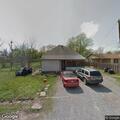 Group arguing in front yard near northwest 2nd street in Krebs