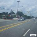 Parking lot crash between SUV and sedan