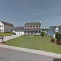Suspicious sedan repeatedly passing residence