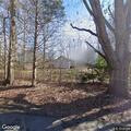 Tree on power line causes fire hazard near home