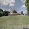 Person throwing objects in yard on Phoenix Court
