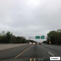 Cars racing and weaving in traffic on I-40