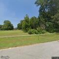 Vehicle near ditch off roadway on Broad Street