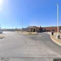 Person suffering from abdominal pain at rehab center