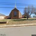 Two children locked in running vehicle at church