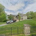 Person heard yelling behind residence