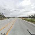 Traffic stop on blue Infiniti SUV in Gibsonton
