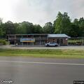 Intoxicated person reported behind restaurant camper
