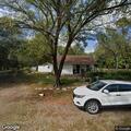 Suspicious person reported near car and porch