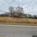 Caller reports possible brush fire on NC 218