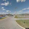 Person in cardiac arrest receiving CPR near Joseph Harp