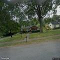 People arguing in front yard on Gad Road
