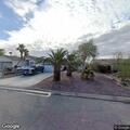 Man and woman yelling outside Fort Mohave home