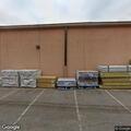 Crew checks reported odor outside home improvement store