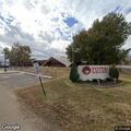 Man stuck on roof by stadium in Poteau
