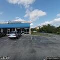 Person unresponsive in sleeping bag at gym entrance