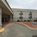 Man lying down outside hotel reported unresponsive