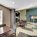 Woman having asthma attack at hotel lobby in Pineville