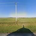 Vehicle and field fire involving farm equipment near power lines