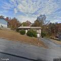 Person with slurred speech and alcohol on porch