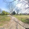 Resident nearly hit by passing vehicle while mowing