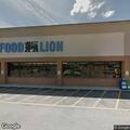 Person grabbing people in Food Lion parking lot