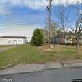 Tree limb on power line blocks road near A.R. Mewborn Road