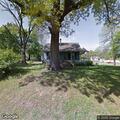Smoking tree after cutting near Railroad Avenue in Plumerville