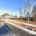 Work trucks hit low power lines on (number withheld) Hill Road