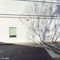 Homeless person sleeping on commercial property