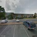 Adult female choking at college hall, EMS assisting