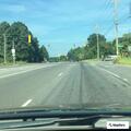 Truck hits traffic light and leaves scene