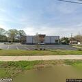 Traffic stop of white Lincoln SUV at Norwood lot