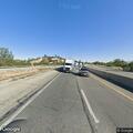 Disabled pickup truck on Highway 58 center divider