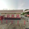 Person sick in yellow tow truck at Midland gas station