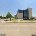 Patient passed out in gray SUV at hospital entrance