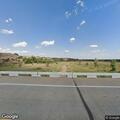 Loose hay blocking lanes near Red River Bridge