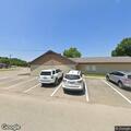 Person experiencing chest pain at care facility room