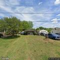 Suspicious person reported going through yard items