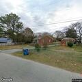 Unknown people knocking on door near E Carr Street in Dunn