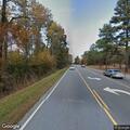 Man in SUV yells at woman walking along road