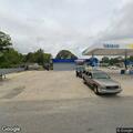 Person experiencing back pain at North Clinton Avenue