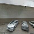 Officer to check parked black Ford sedan at Belk