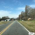 Report of erratic driving by dark jeep near Stanley