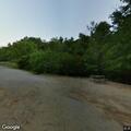 Motorcycle crash with injured rider near Tellico Beach