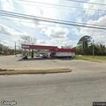 Person having difficulty breathing at gas station