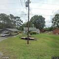 Crews check extinguished lawnmower fire on Shelby Hwy
