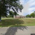 Traffic stop on silver Ford pickup near cemetery
