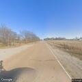 Unoccupied semi truck left running by roadside
