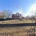 Large backyard fire near trees at Altus home